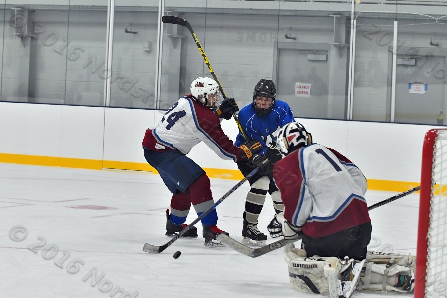 Wheaton College Men\'s Ice Hockey vs Middlesex Community College. - Photo By: KEITH NORDSTROM